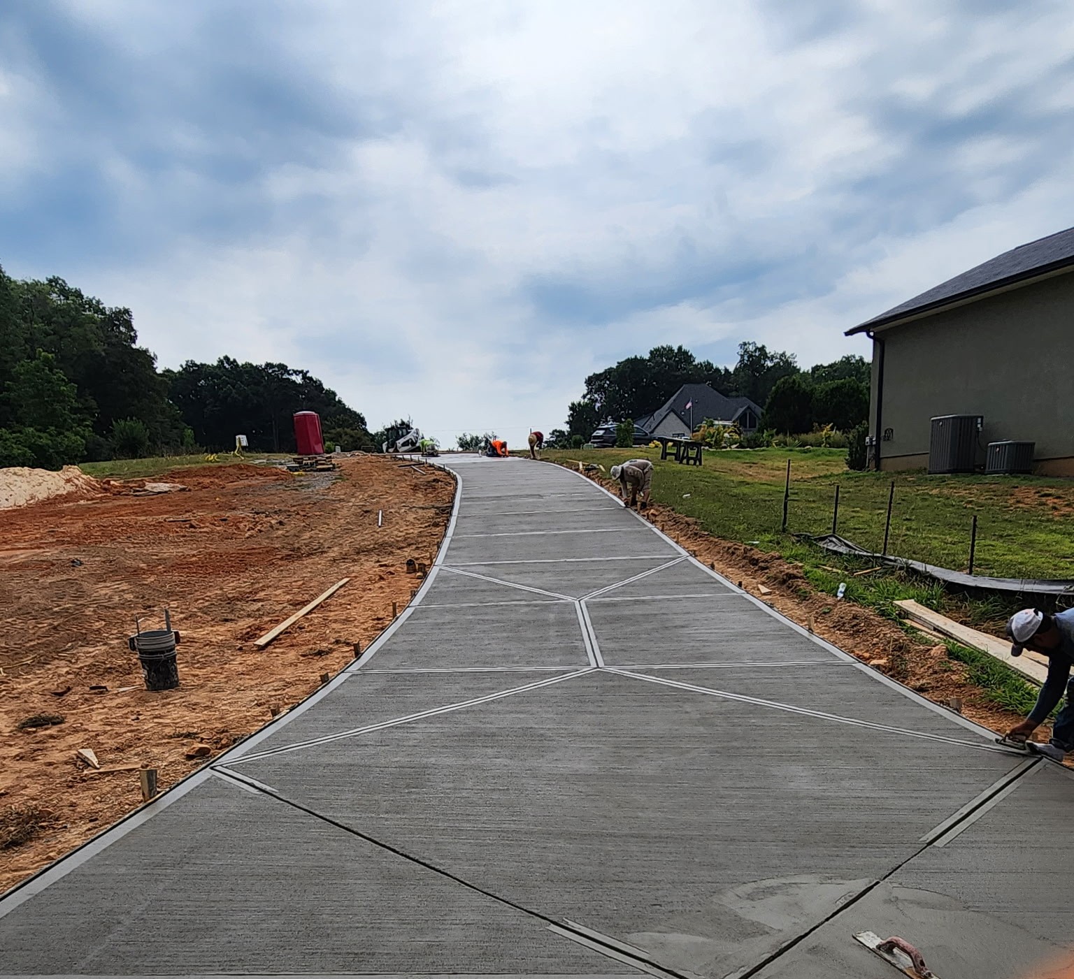 Concrete flatwork and driveway by SD Masonry in Charlotte, NC
