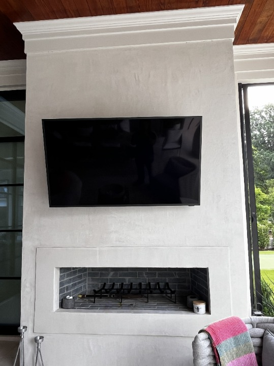 Modern indoor linear fireplace built by SD Masonry
