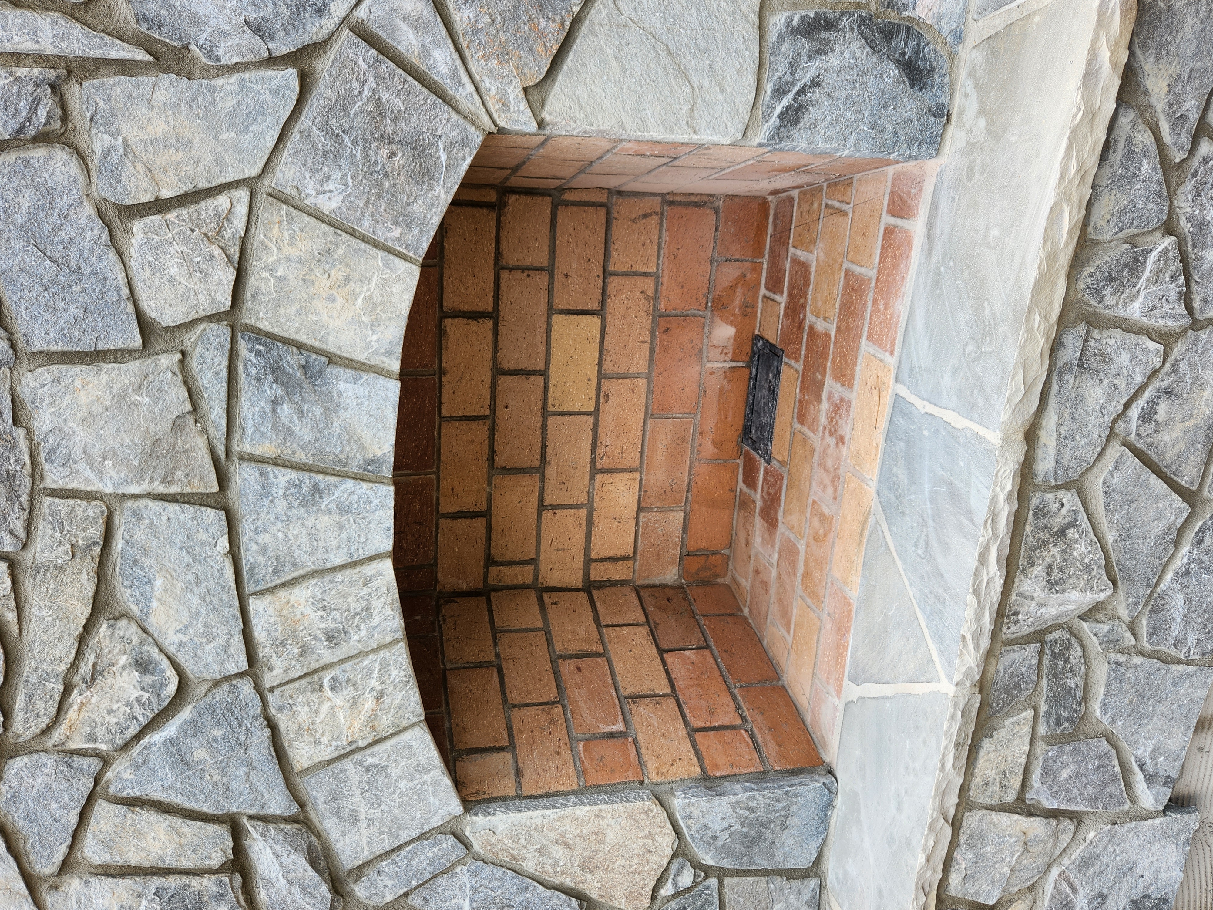 Stone fireplace detail and mortar work by SD Masonry