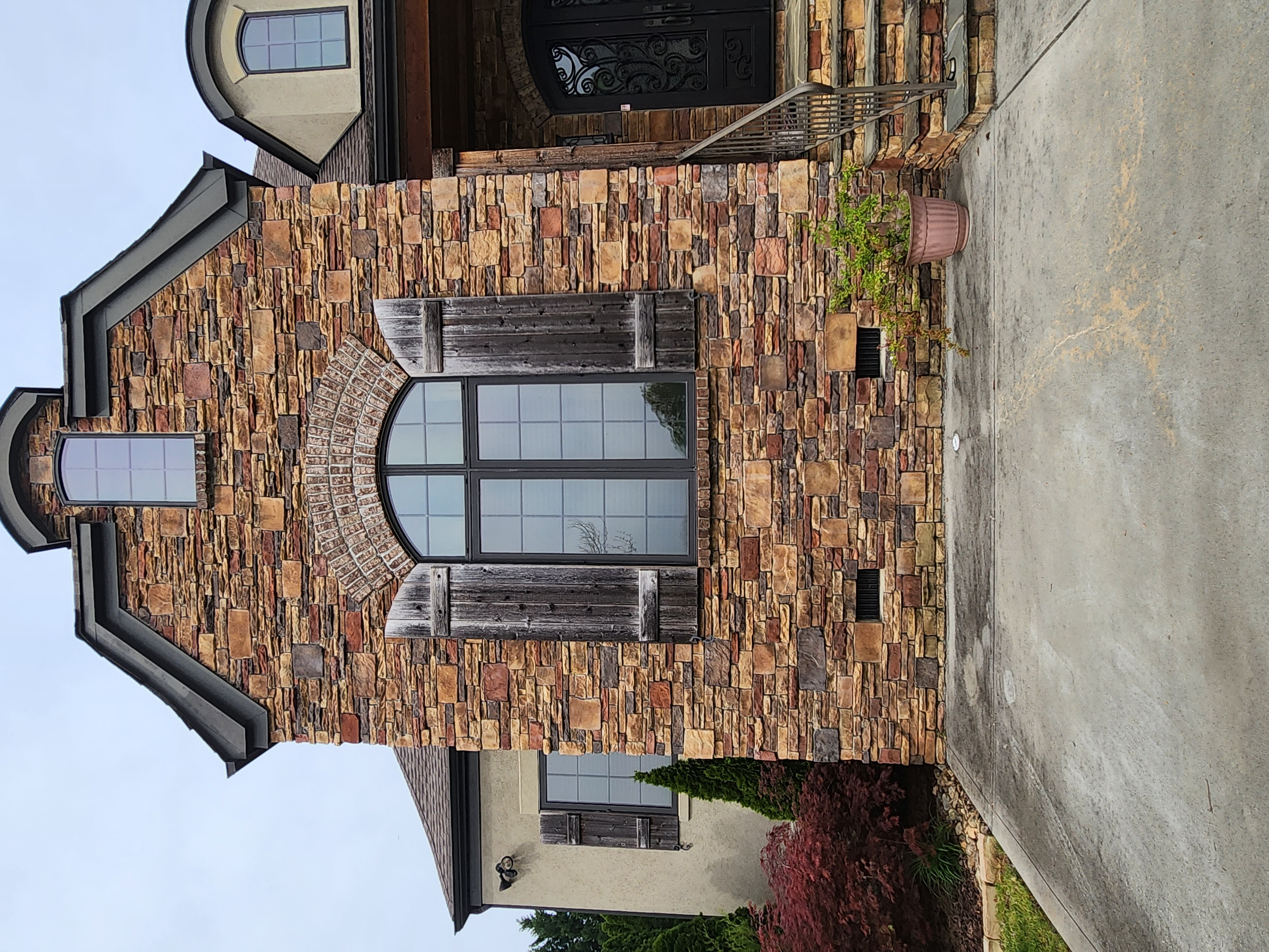 Stone veneer exterior installation by SD Masonry
