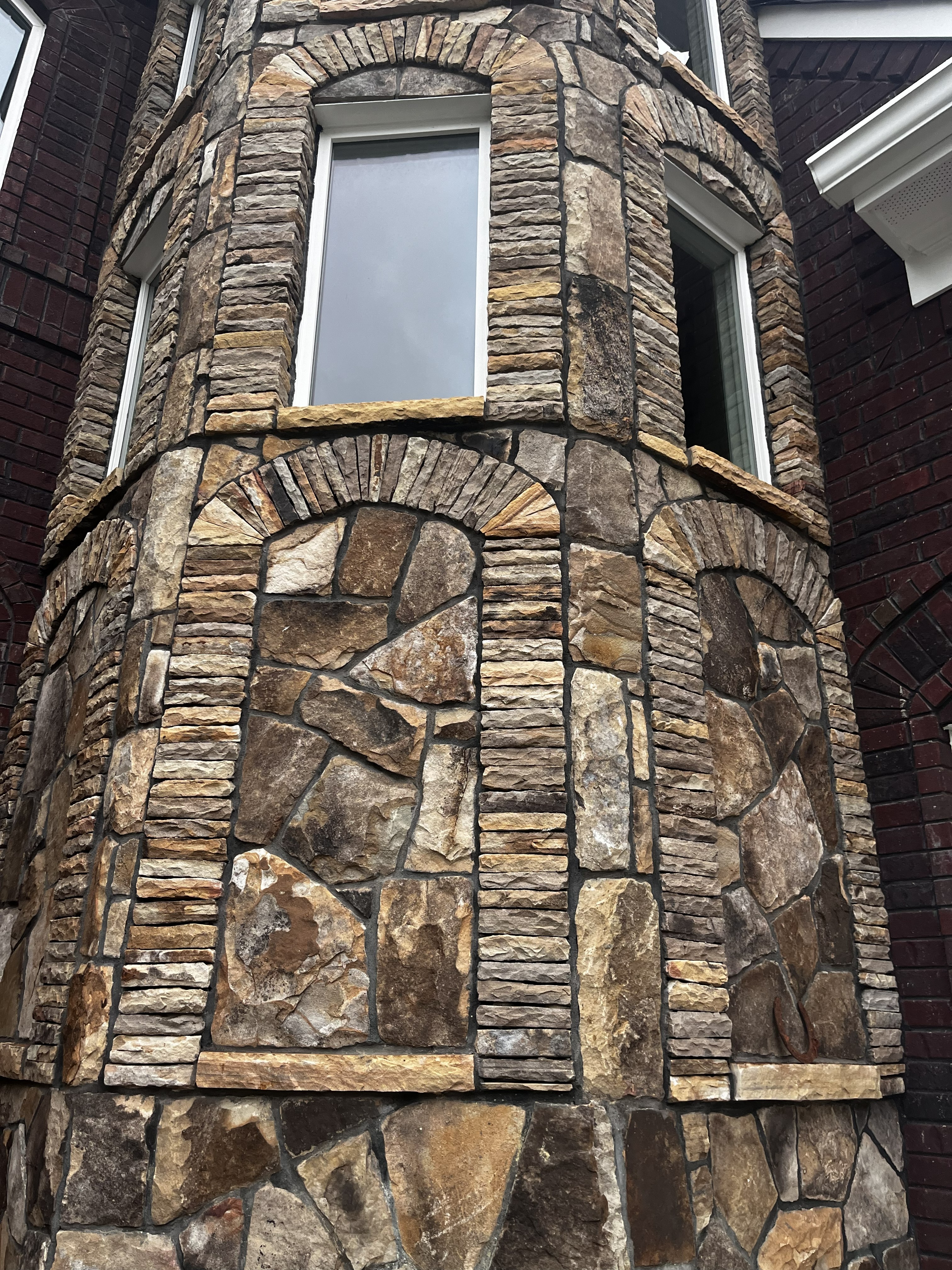 Custom stone veneer tower detail by SD Masonry